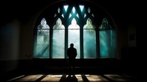 Light And Shadows On The Man Praying 