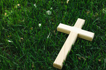 a cross in the grass 