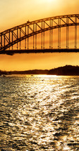 bridge over water at sunset 