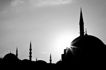 silhouettes of mosque towers