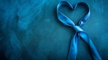 The Heart Knot in a blue tie