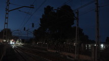 Passenger train passing by at night