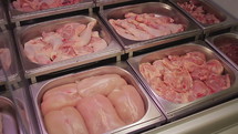Fresh raw chicken in a grocery store.