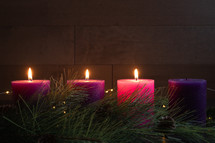 three advent candles lit