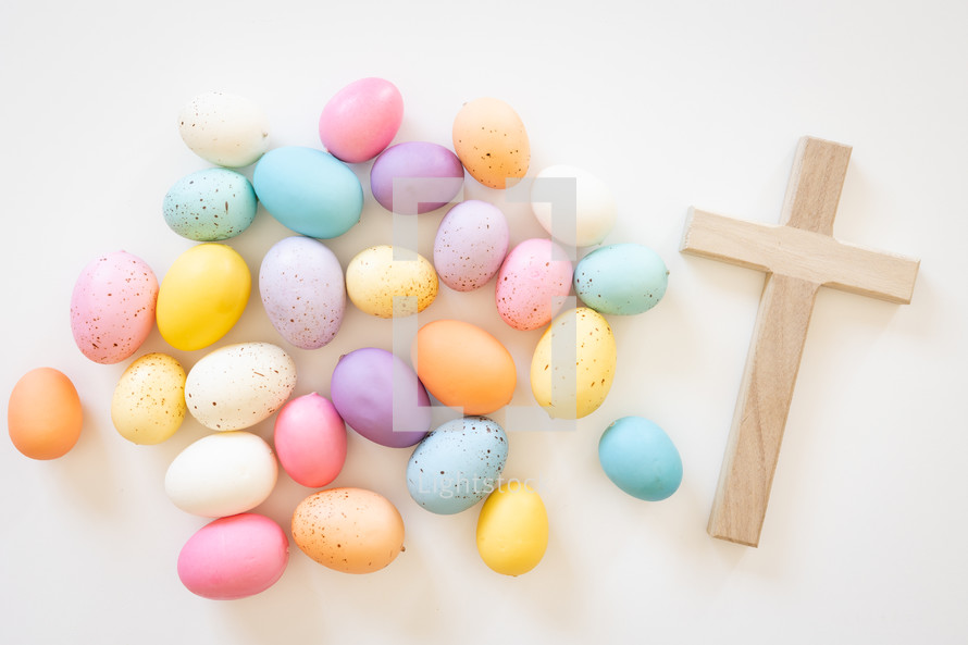 Wood cross and easter eggs