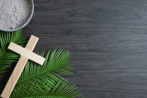 Border of cross, palm leaves and bowl of ashes