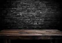 background of barrel and worn old table of wood in front of a brick wall