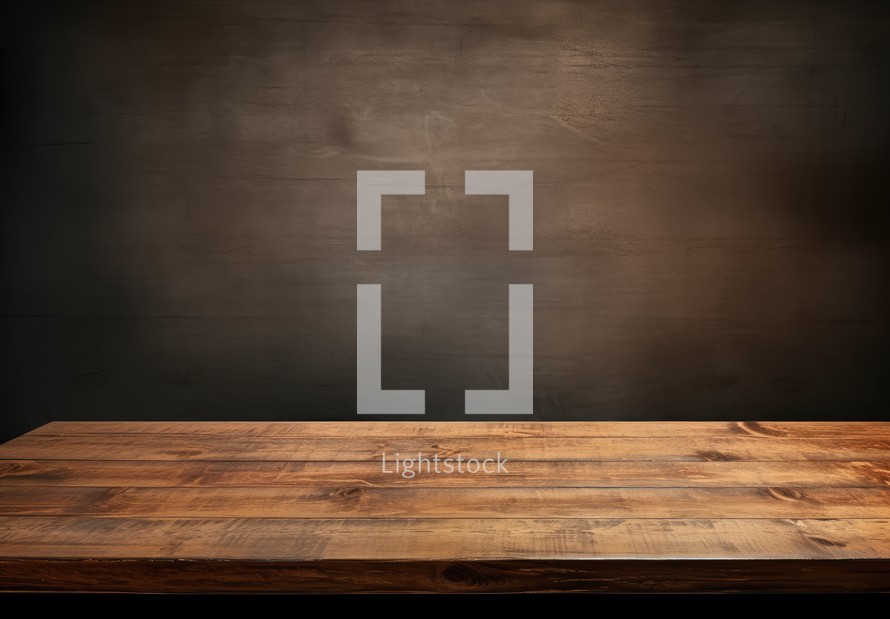 Empty wooden table for product placement or montage with dark background.