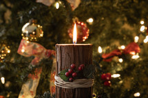 Christmas candle and bokeh lights 