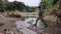 Asian Troops Crossing Jungle Stream War Warfare Guns Gun Riffel Ak 47