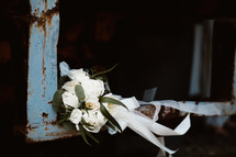 bride bouquet in the corner of a rusty window sill 