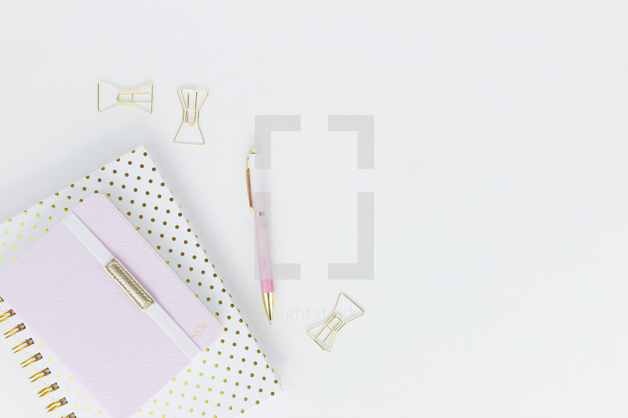pink, polka dot, notebooks, journal, white background, pen, desk, paper clips 