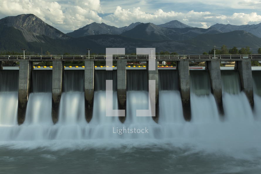 water flowing through a hydroelectric dam