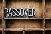 word passover in blocks on a bookshelf 