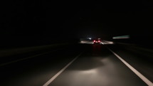 Driving at night on a highway. Time lapse footage
