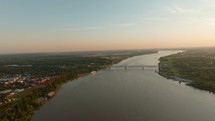 Drone Video of Mississippi River in Natchez, Mississippi at Sunset Looking South. High quality 4k footage