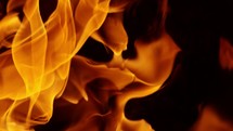 slow motion of a close up of flames from a fire.