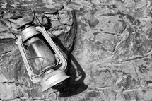 vintage lantern on a rock 