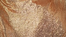 flowing glittery gold fabric background 