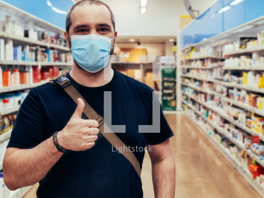 man wearing a face mask at a store 