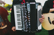 a man playing an accordion 