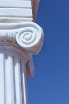 white column against a blue sky 