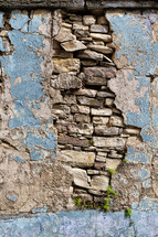 exposed stone in an old broken wall 