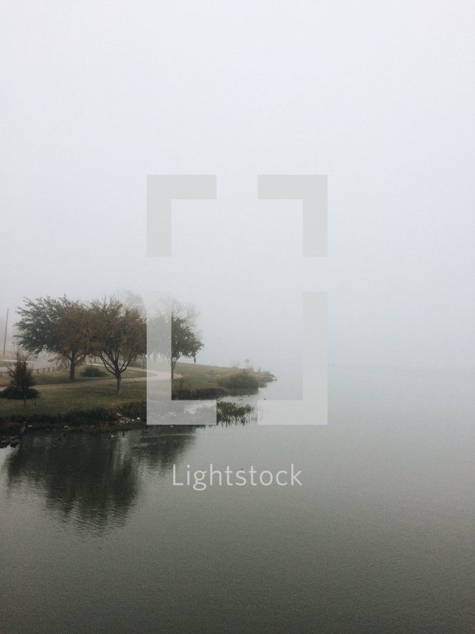fog over a lake 