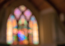 blurry stained glass window in a church 
Enter His Gates with Thanksgiving