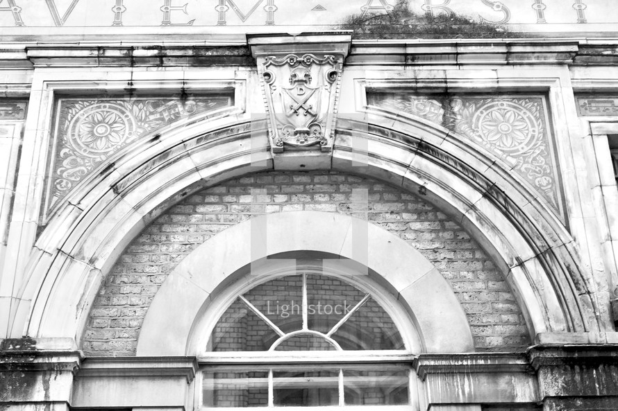 arched window on a building in old London 