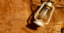 lantern on red rock in Jordan 