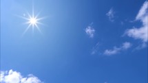sunburst in a blue sky 