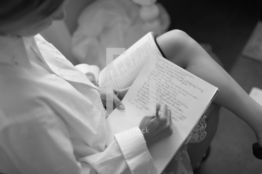 a woman taking notes 
