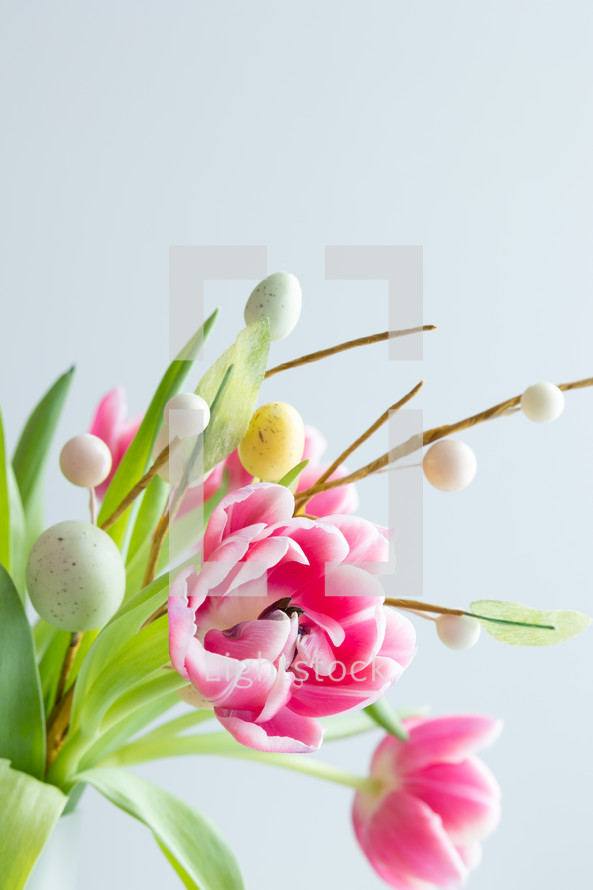 Pink flowers with Easter egg decoration