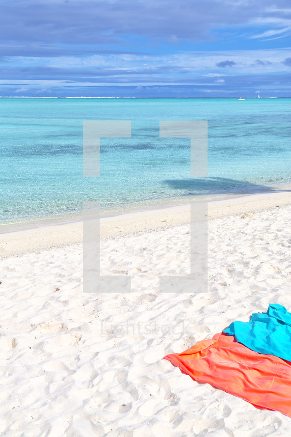 beach towels on the sand of a Polynesian beach 
