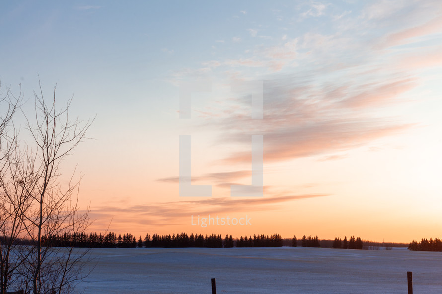 winter prairie at sunset 