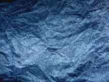 crumpled blue paper texture background