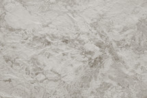 painted textural surface in neutral tones and low contrast