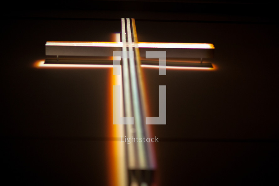 light behind a cross 