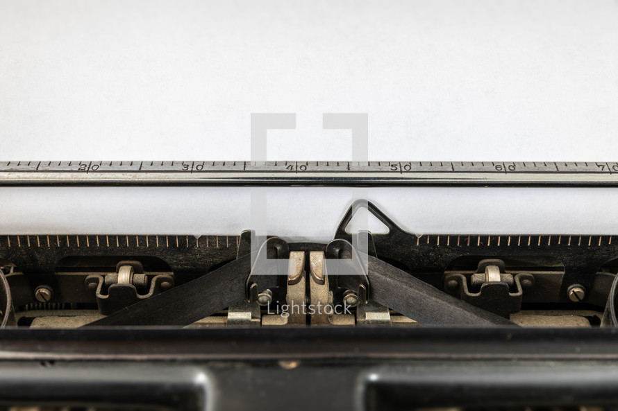 blank paper on a typewriter 
