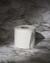 toilet paper on marble background 