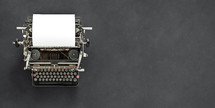 blank paper on a typewriter 
