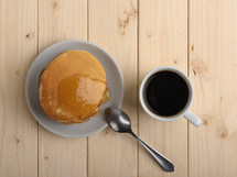fresh pancakes with a cup of coffee