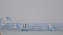Rear View Of A Cargo Ship from Zanzibar In Fog At The Galati Port In Galati city, Romania. wide, 4k