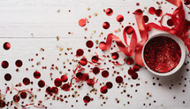 Red Confetti and glittter on White Background