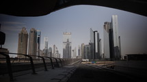 Inside the Dubai metro station with buildings and skyscrapers in the distance in the United Arab Emirates. 