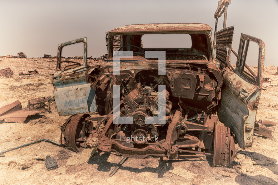 old rusty abandoned truck in a desert 