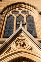 carving of Mary over a church entrance 