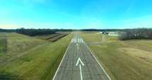 4K Aerial Low Pass Over Airport Runway Operated With Permission