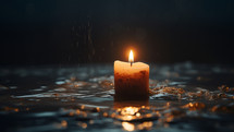 Candle of hope on a wet floor